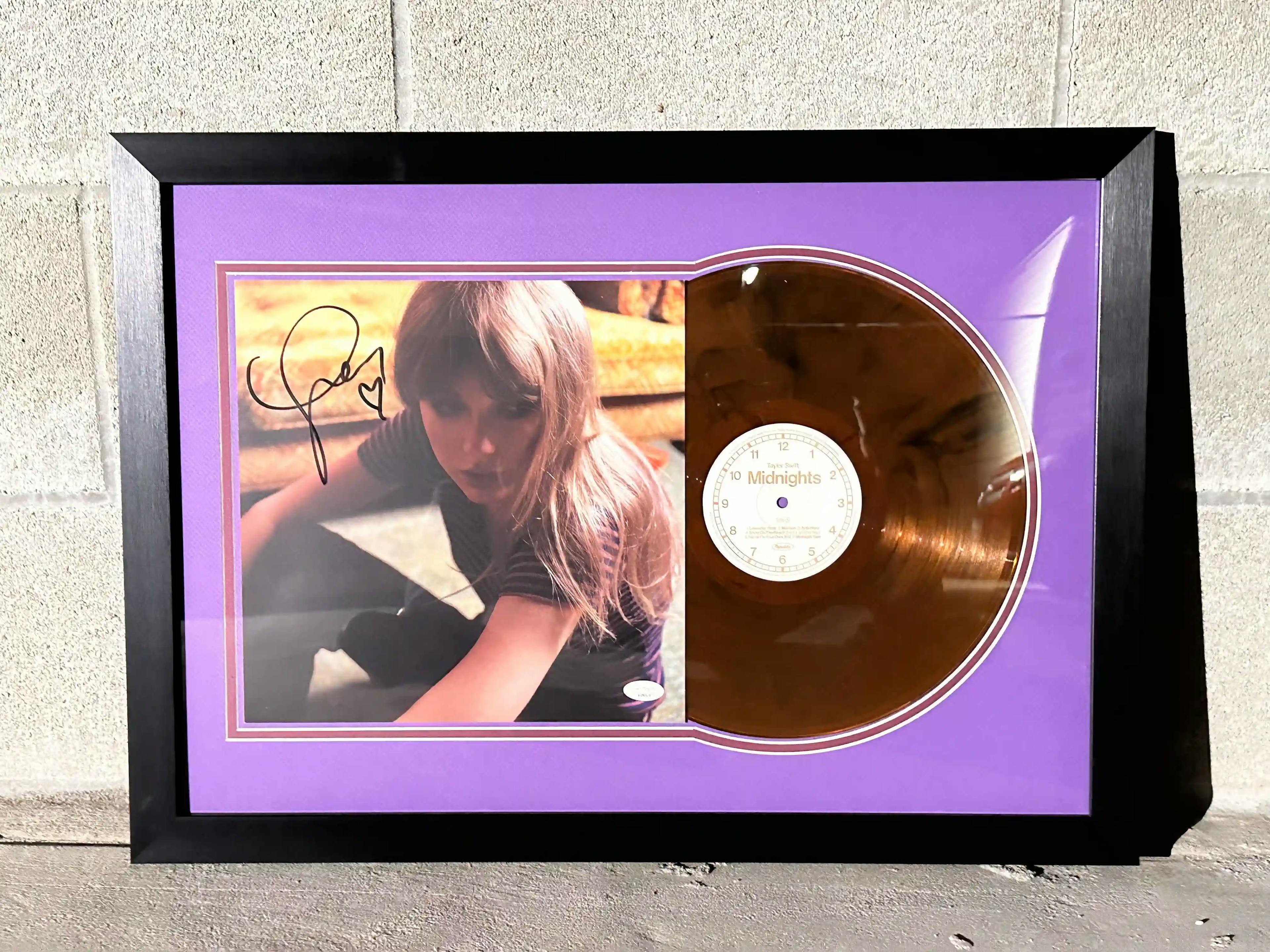 Charitybuzz: Taylor Swift Midnights Signed Album Collection Matted